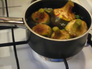 Place the artichokes in the pot tightly, so that they cannot tip over